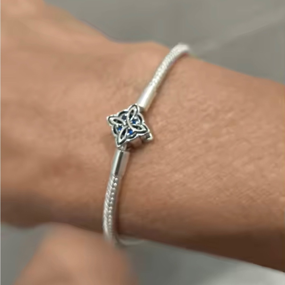 Sterling Silver Celtic Knot Bracelet with Blue Accent